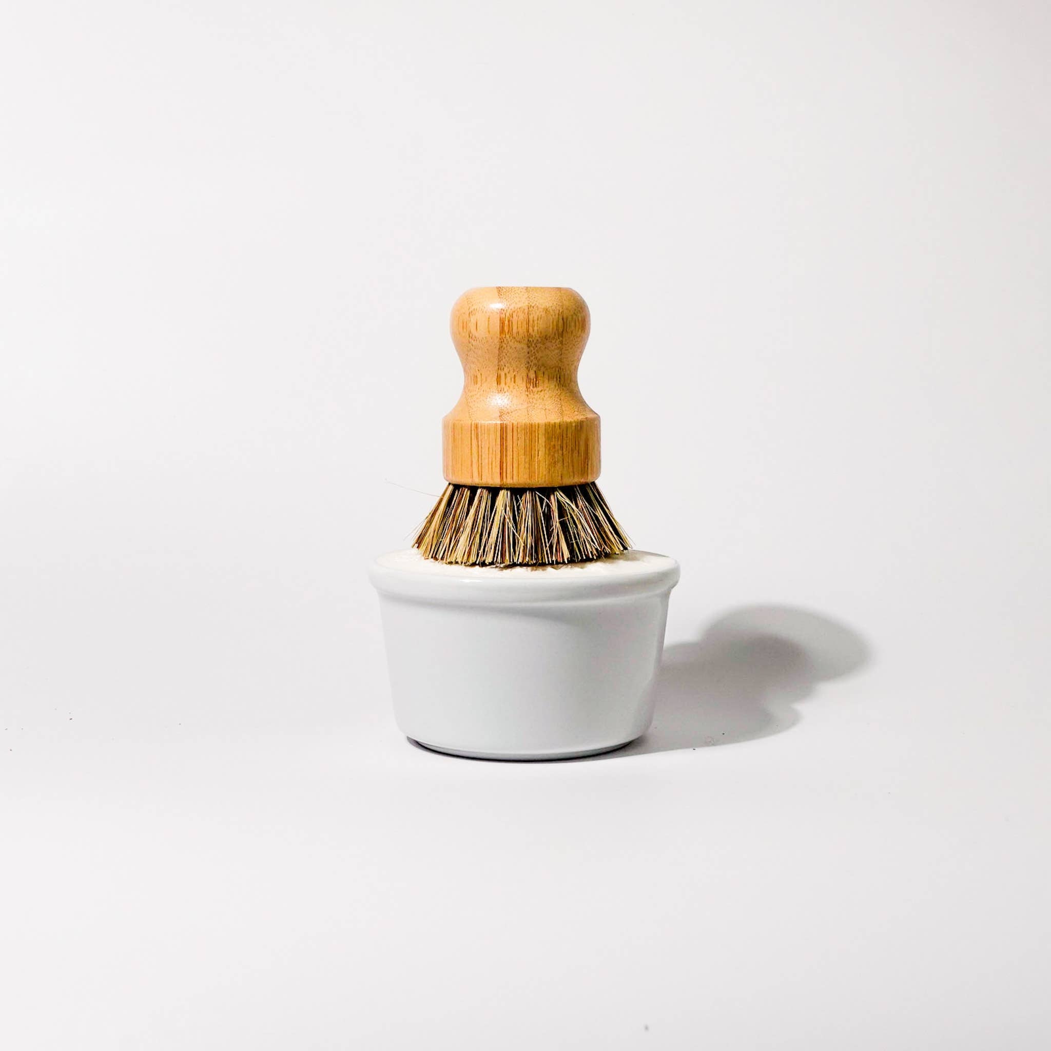 Solid Dish Soap in a white bowl by ardent goods
